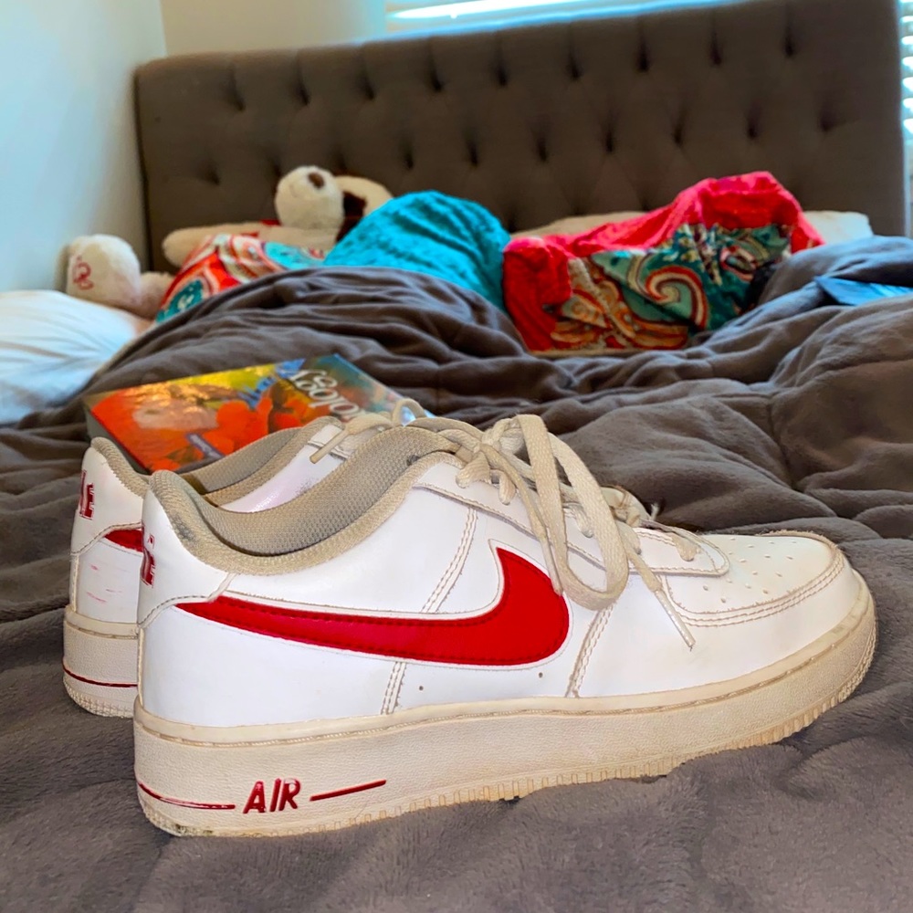 Nike Air Force 1 with red swoosh